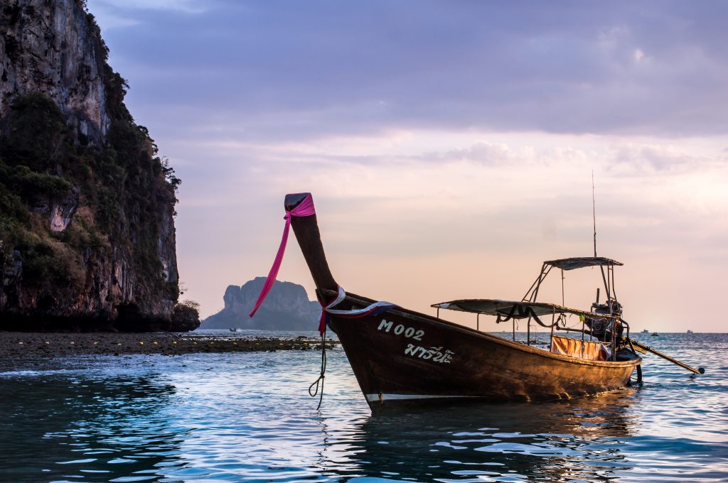 beautiful railway east sunset long tail boat